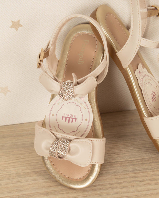 SANDALIA CON HEBILLA Y LAZOS CON BRILLOS