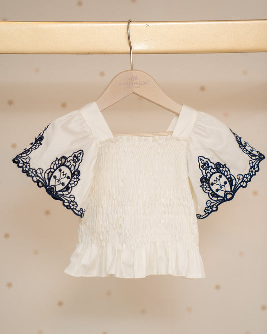 CONJUNTO BLUSA CON MANGAS Y MANGAS BORDADAS