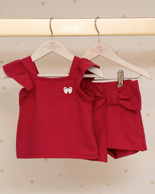 CONJUNTO BLUSA ARANDELAS Y FALDA SHORT PLUMETI