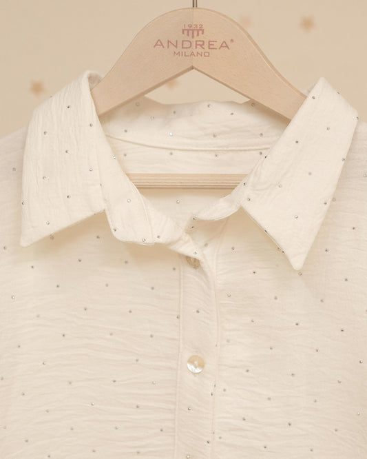 BLUSA CON MANGAS Y BRILLOS