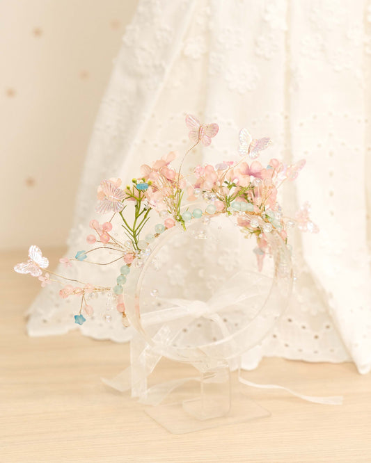 CORONA DE FLORES Y MARIPOSAS